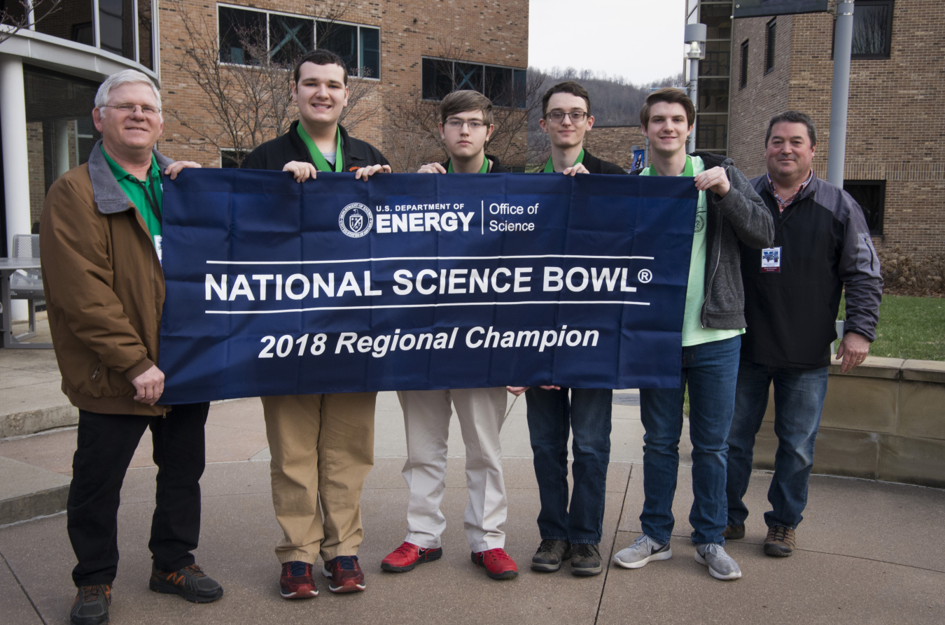 Wheelersburg’s winning team, from left: Coach Paul Boll, Jacob Lewis, Seth Pertuset, Gus Shoemaker, Aaron Bundy; with Greg Simonton from DOE's Portsmouth/Paducah Project Office.