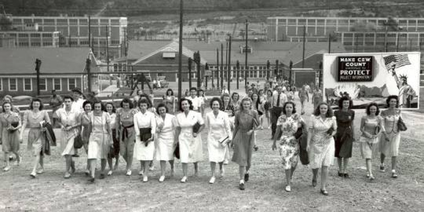 1945: Women finish their shift at Y-12 National Security Campus. More than 22,000 workers clocked in and out every day.