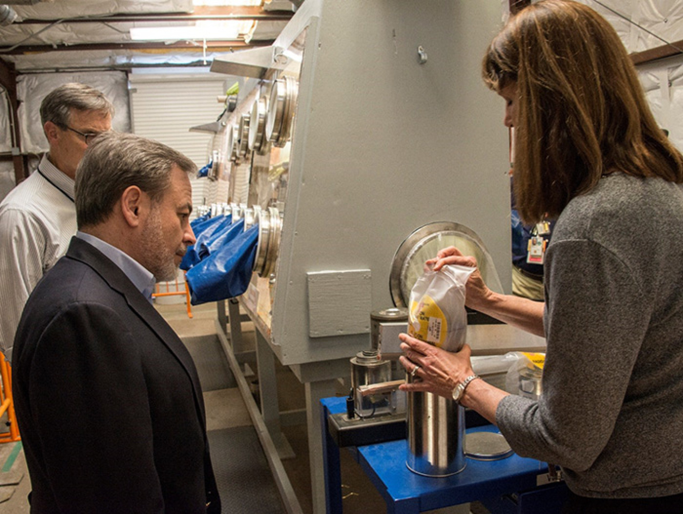 K Area Facility Manager Janice Lawson explains the plutonium downblend process to Deputy Energy Secretary Dan Brouillette at the site’s plutonium mockup facility.