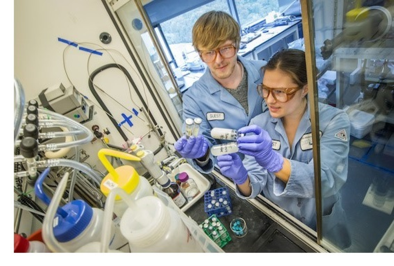 Man and a woman conducting research in a laboratory