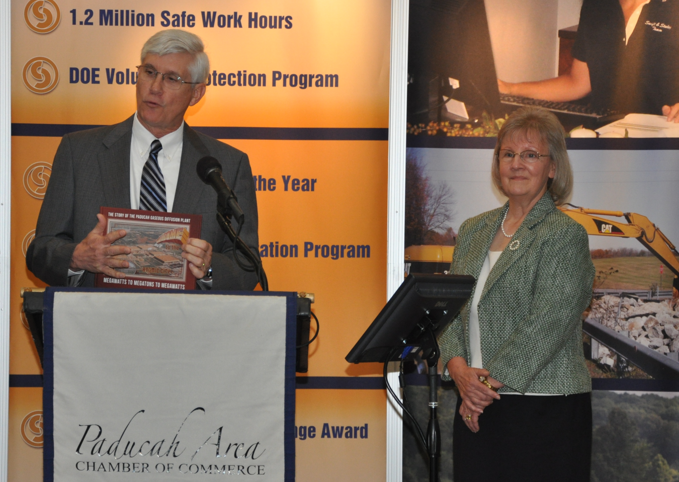 CAB Member Judy Clayton (right) was project leader in an effort that resulted in the 2013 publication of a book that captures the history of DOE’s Paducah site.