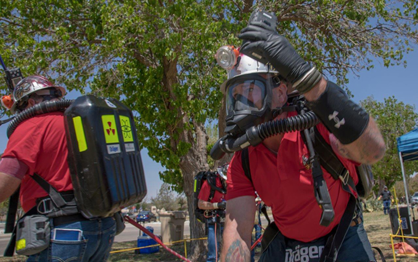 Waste Isolation Pilot Plant Red Team member Mark Long Jr. demonstrates gas detection techniques at the mine rescue team competition.