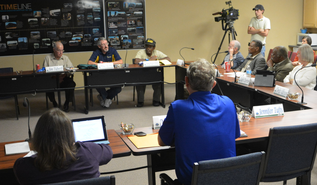 The CAB Board is shown during a 2013 meeting discussion. 