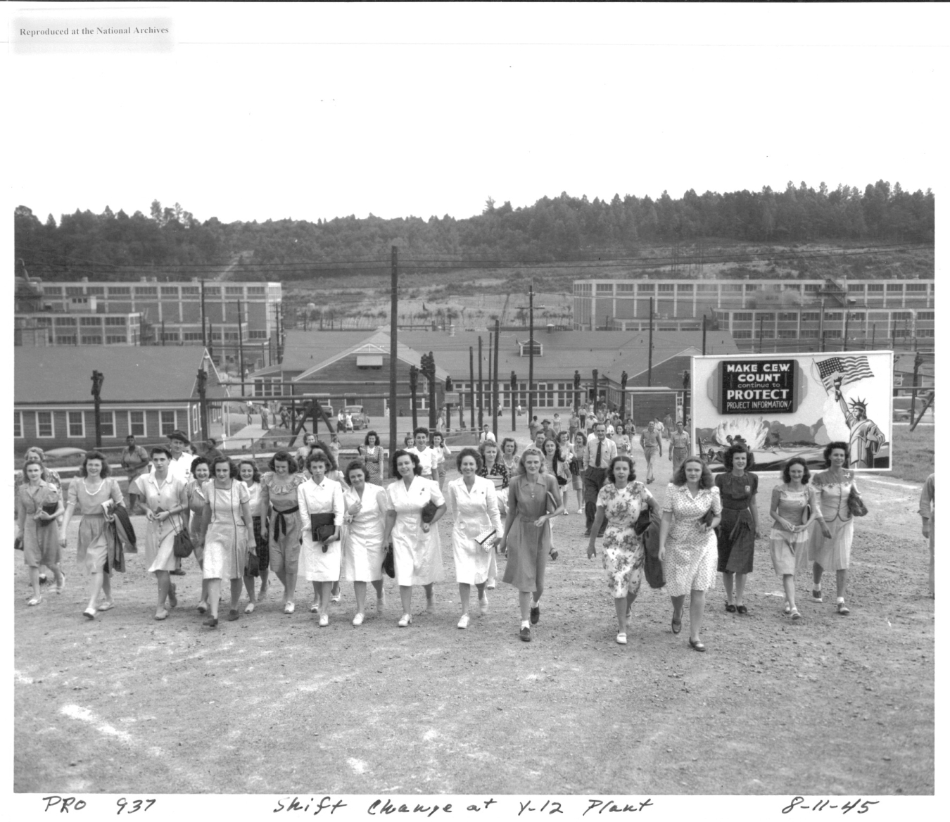 Many of the workers in the three Secret Cities of the Manhattan Project were young women. The group seen here is leaving the Y-12 plant, where uranium was enriched through electromagnetic separation. 