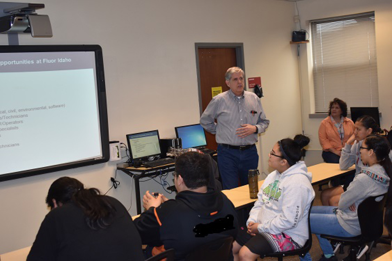 Fluor Idaho President Fred Hughes talks to students in a Fort Hall Junior and Senior High School career opportunity class organized by the Foundation for Indigenous Education, Leadership Development, and Sustainability.