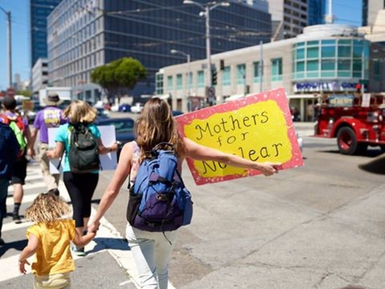 Mothers for Nuclear carrying signs advocating for nuclear energy