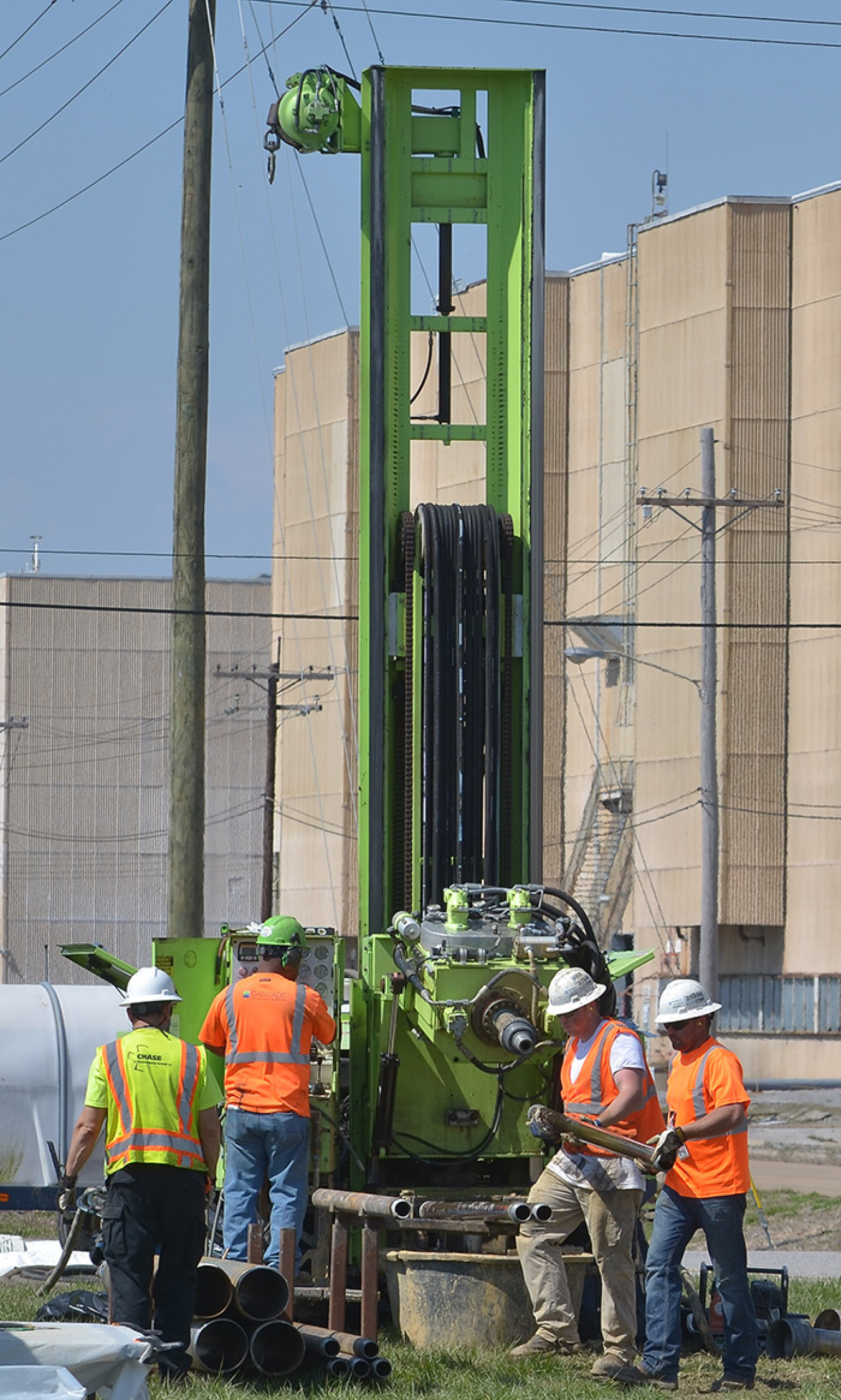 Drill rig operators prepare to retrieve a sample to be used to determine the location of the wells to optimize pump-and-treat operations at the Paducah Site’s northeast plume.