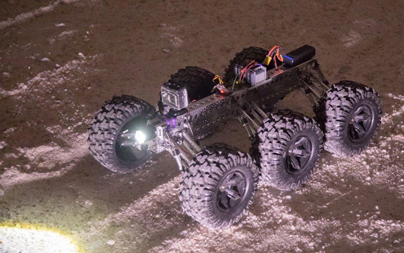 A robot designed and built by area high school students is tested in the Waste Isolation Pilot Plant underground.