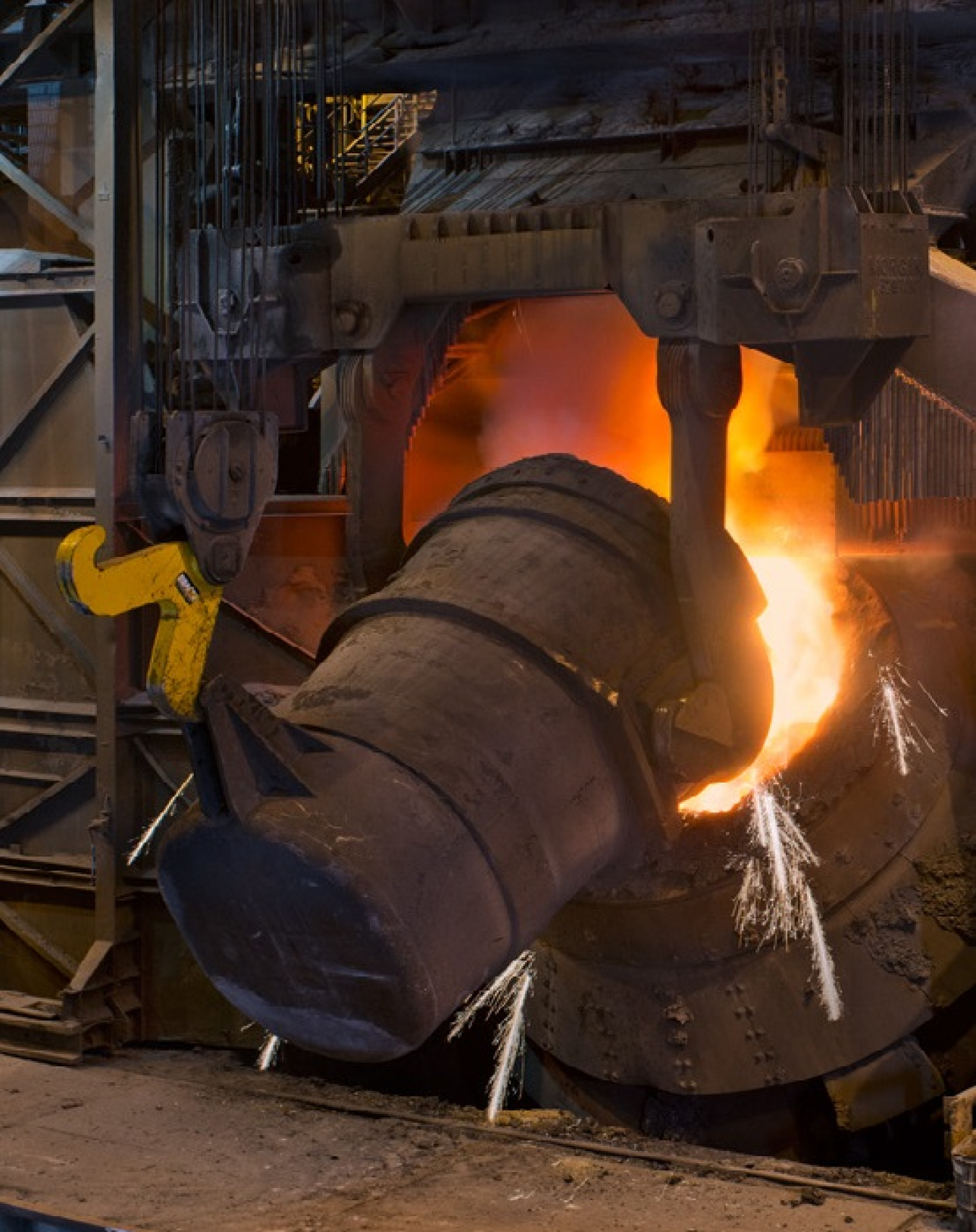a photo of steel being smelted on an industrial scale.