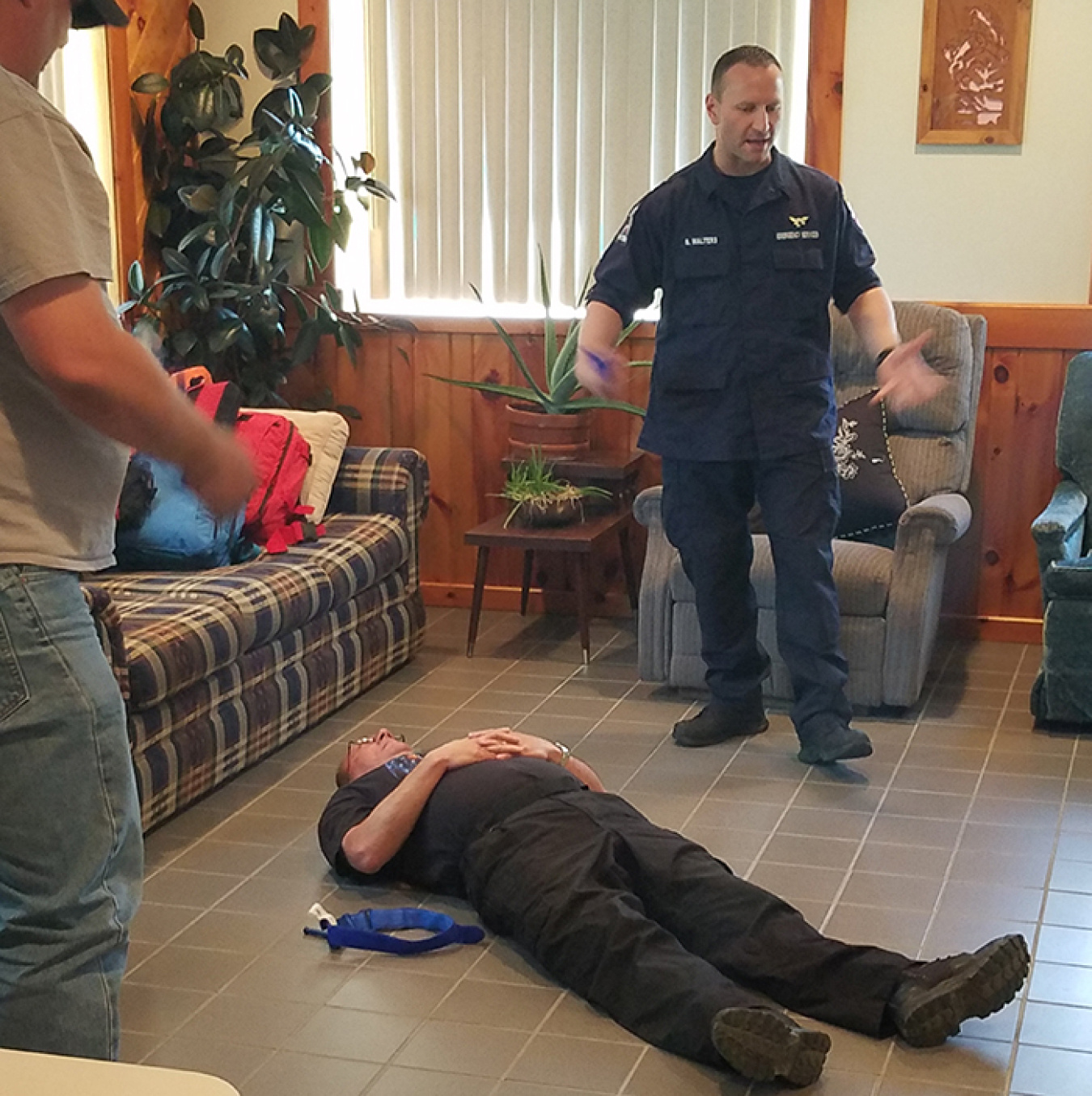 Trainees listen to instruction from Cattaraugus County Public Safety/Emergency Services Medical Director Dr. Brian Walters on the use of tourniquets to help stop the flow of blood in the event of a high-threat emergency.