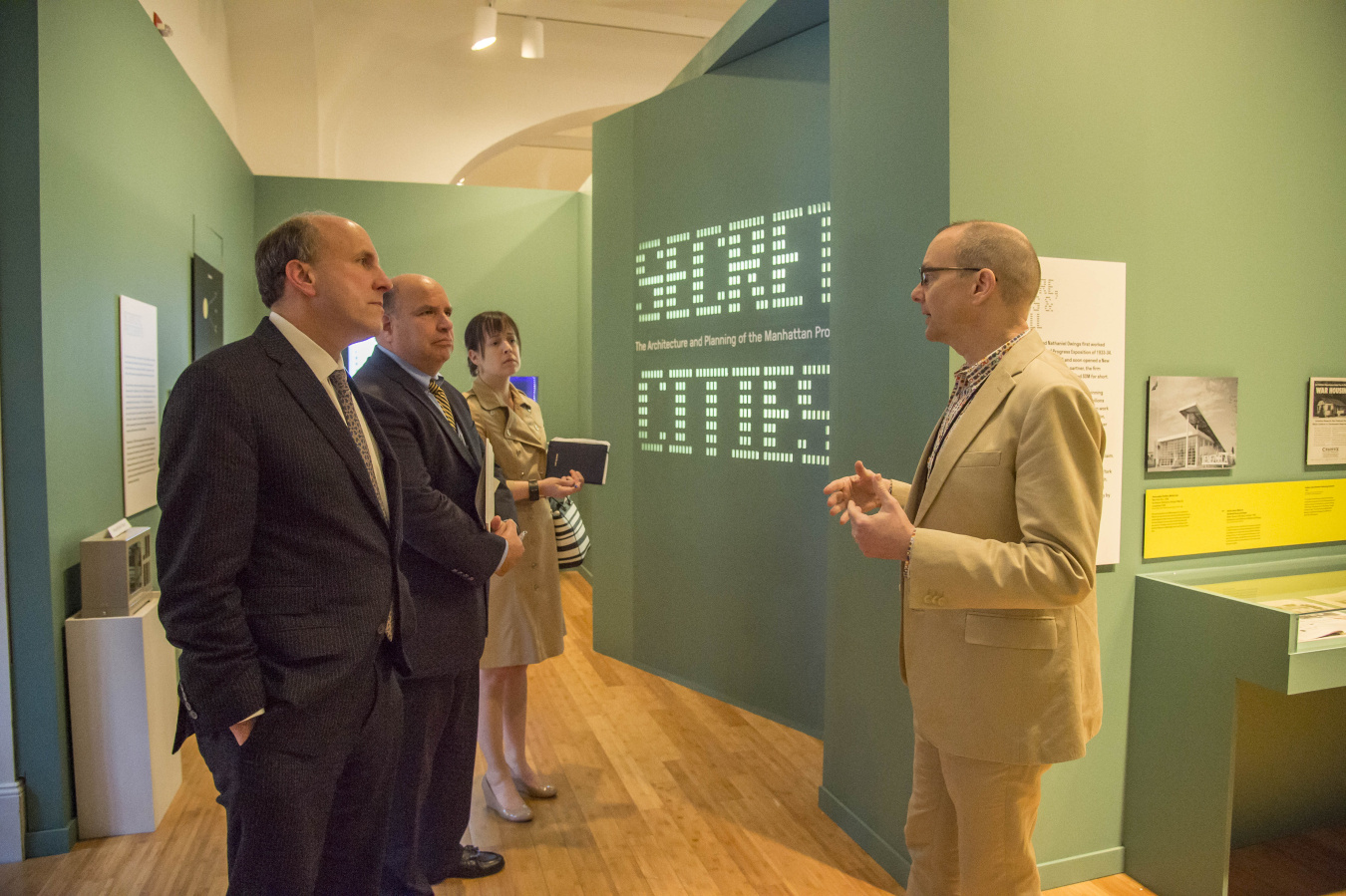 DOE Under Secretary Dabbar Tours Exhibit on "Secret Cities" Linked to EM Cleanup