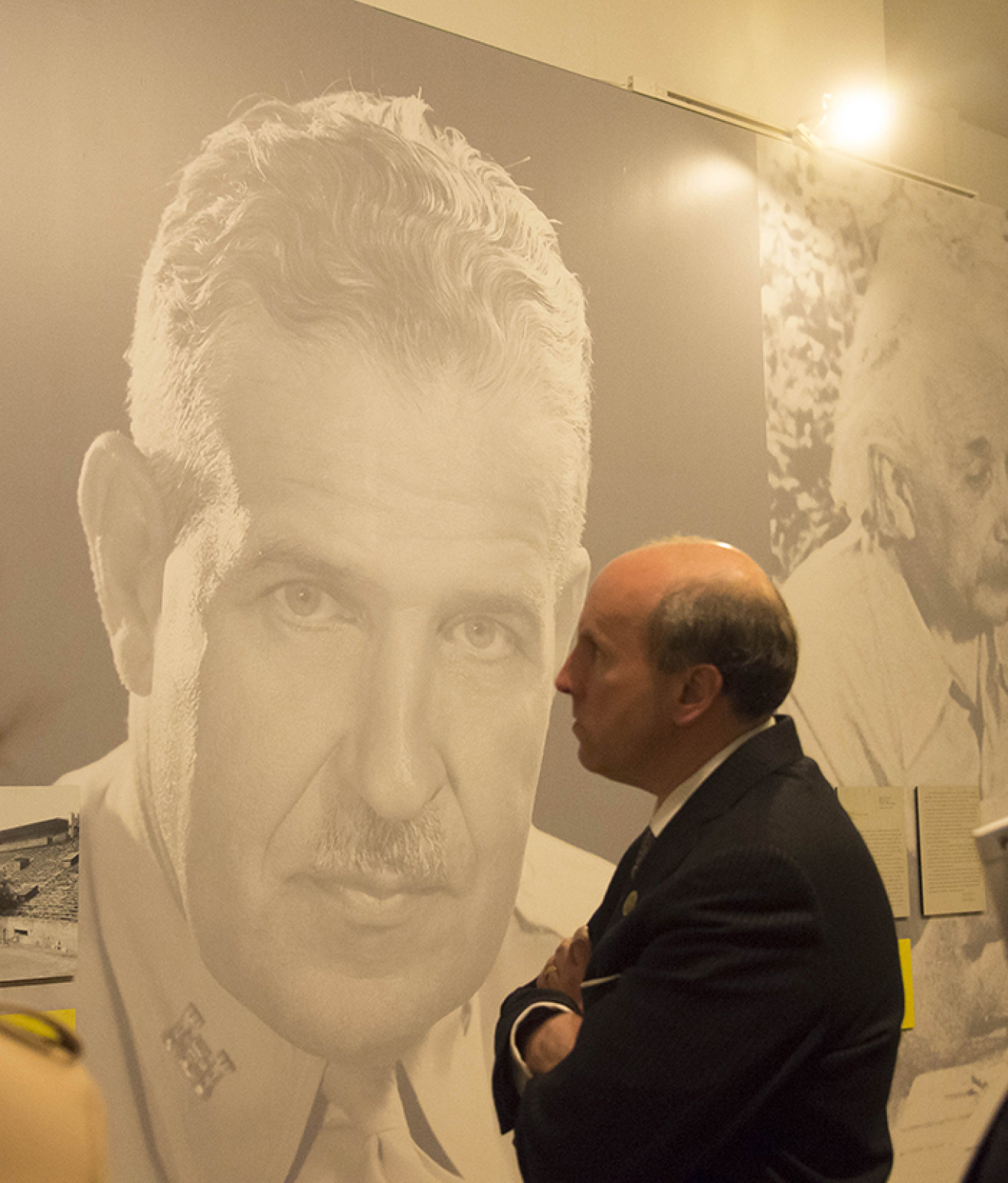 DOE Under Secretary Dabbar Tours Exhibit on "Secret Cities" Linked to EM Cleanup