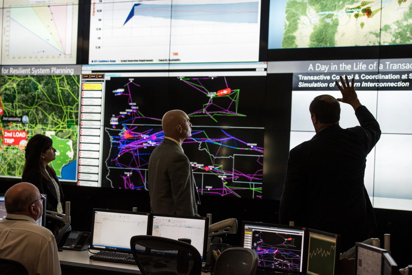 Assistant Secretary Walker with Carl Imhoff who leads PNNL's Laboratory Objective for a Secure and Efficient Grid