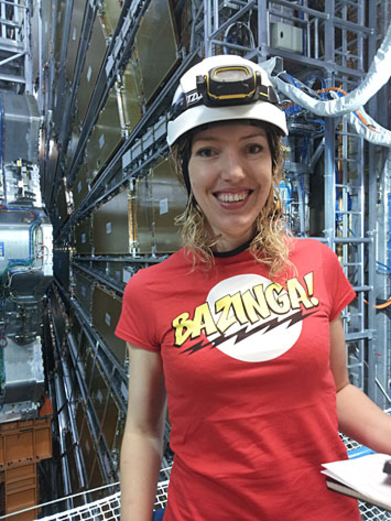 Brookhaven Lab physicist Claire Lee stands in front of the muon spectrometer of the ATLAS detector.