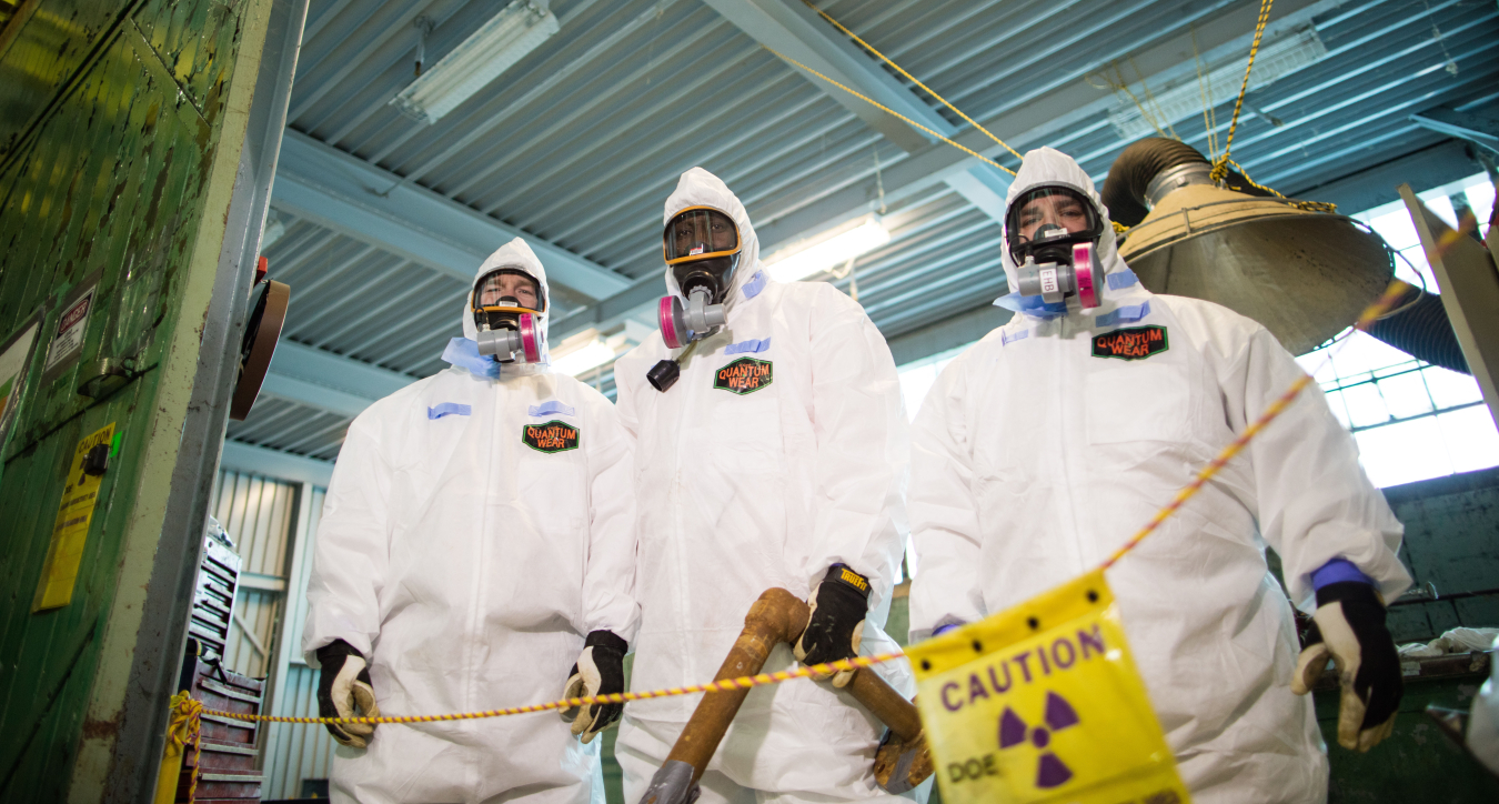 A cleanup crew from Fluor Federal Services works in the C-400 building at Paducah.