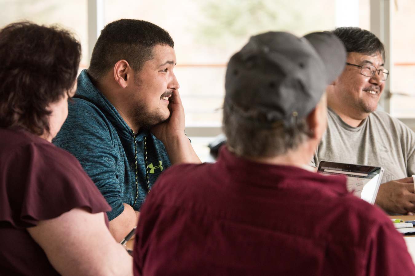 A group of people attend a workshop in Alaska.