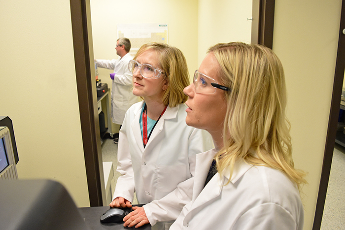 Two chemists train at a local college laboratory with equipment that will eventually be transferred to the Hanford Waste Treatment and Immobilization Plant’s Analytical Laboratory.