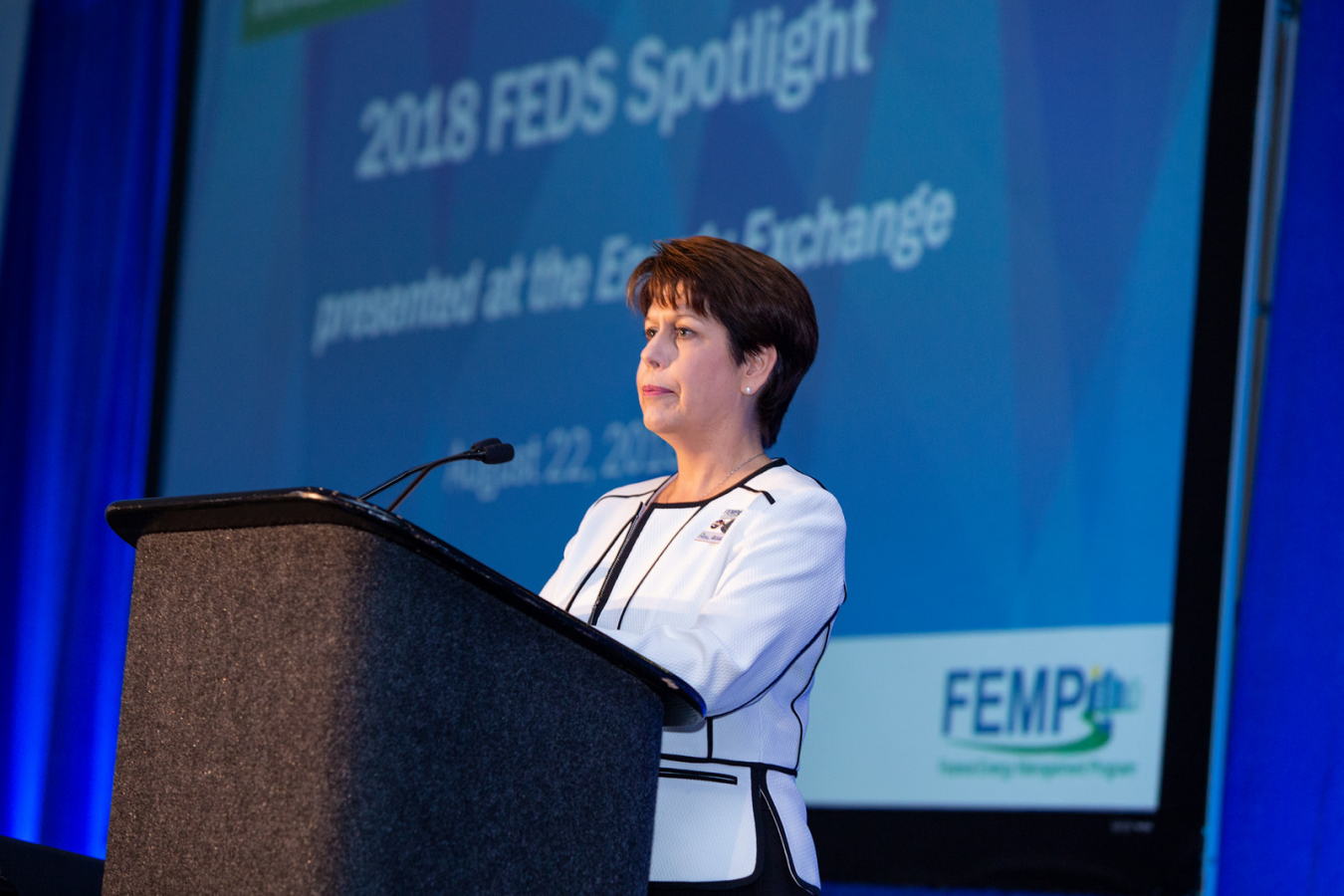 Leslie Nicholls, FEMP Director, speaking at FEDS Spotlight 2018.