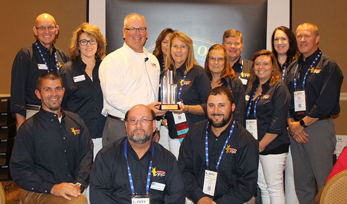 Savannah River Nuclear Solutions employees accept the Voluntary Protection Program Legacy of Stars Award from DOE Office of Worker Safety and Health Assistance Director Brad Davy.