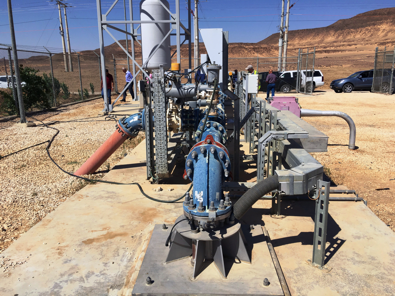 IAEA tour of 325 km (202 mi) Disi-Mudawarra to Amman Water Conveyance System, a first of 55 production wells constructed 530 m (1740 ft) deep, completed in 2012 at a cost of over $1 billion. Groundwater contains naturally occurring radioactivity. 
