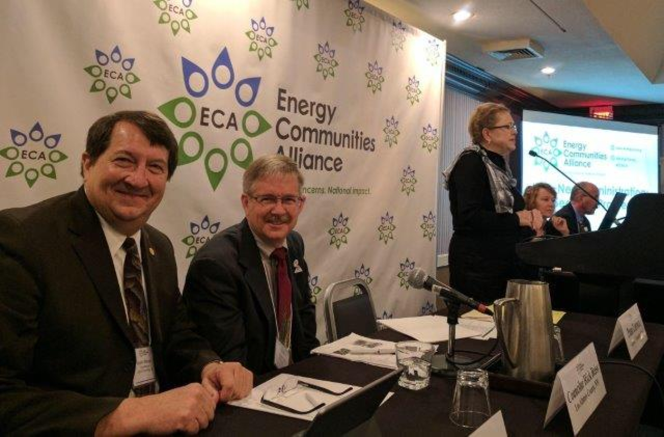 Mark Watson, Oak Ridge City Manager, Rick Reiss, Los Alamos County Councilor, and Pam Larson, Hanford Communities Executive Director, address the audience during the ECA spring meeting.