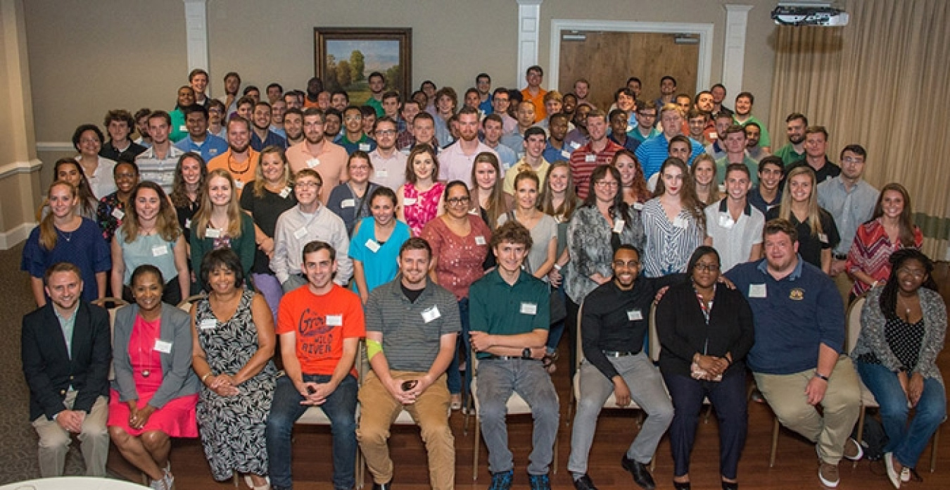 Savannah River Nuclear Solutions interns gather for a photo during a reception this summer where they talked with Savannah River Site executives and other site employees.