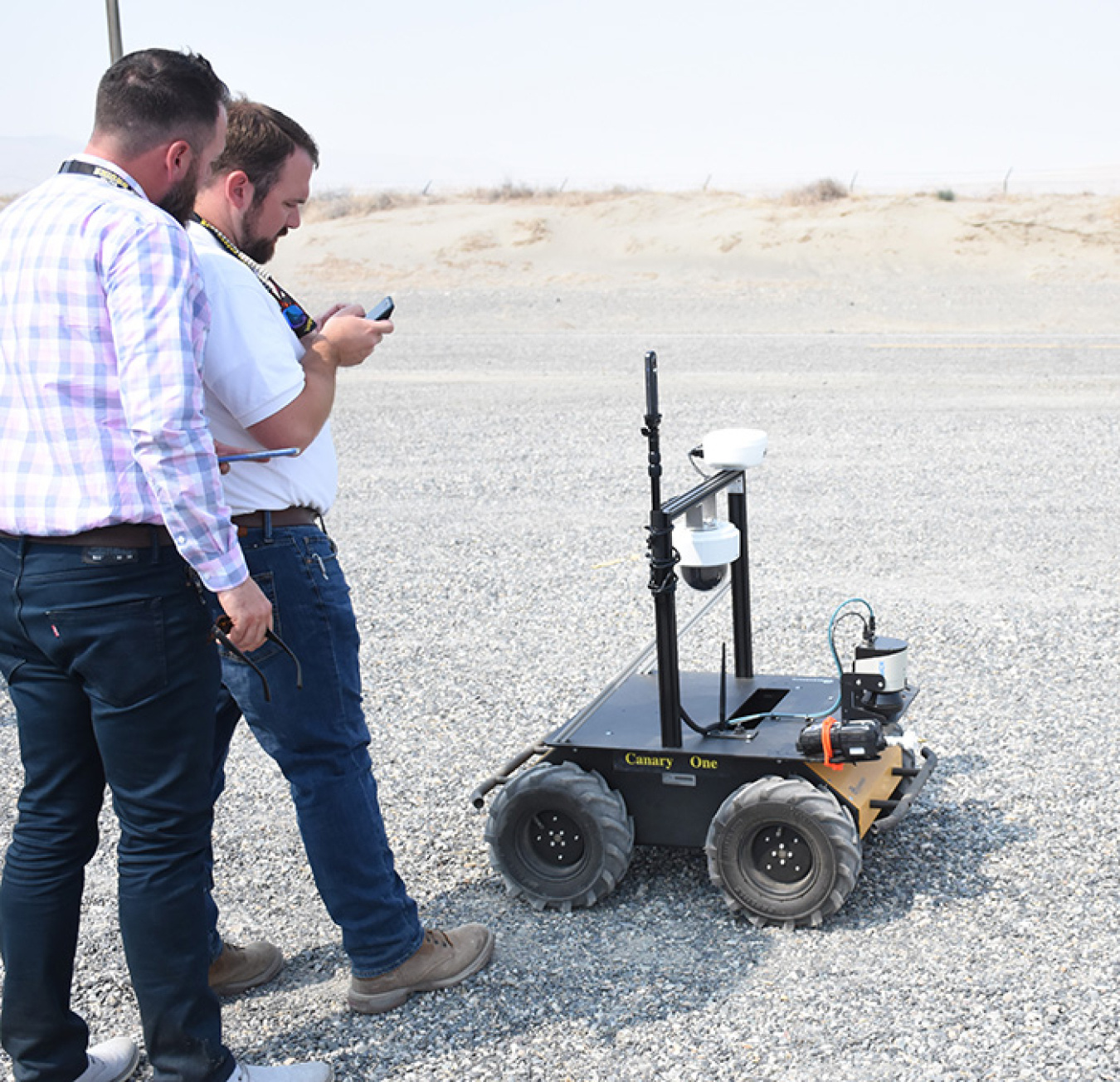 Washington River Protection Solutions staffers prepare the rover for its next demonstration.
