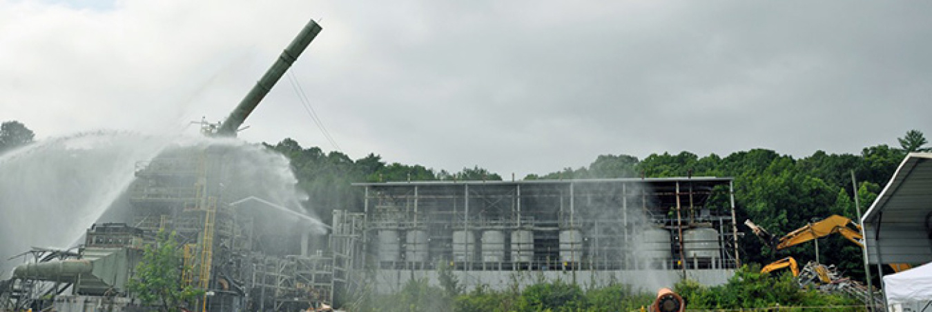 Crews take down a 100-foot stack at the Toxic Substances Control Act Incinerator.