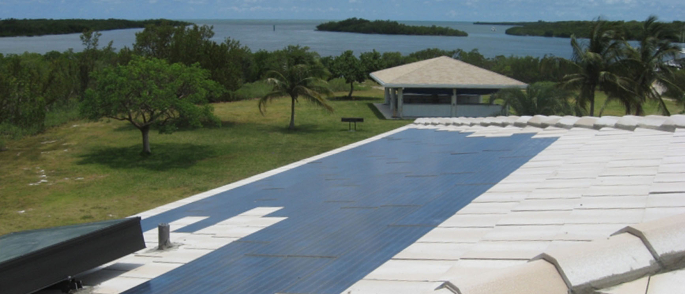 Aerial view of PV panels on a building overlooking Biscayne National Park.