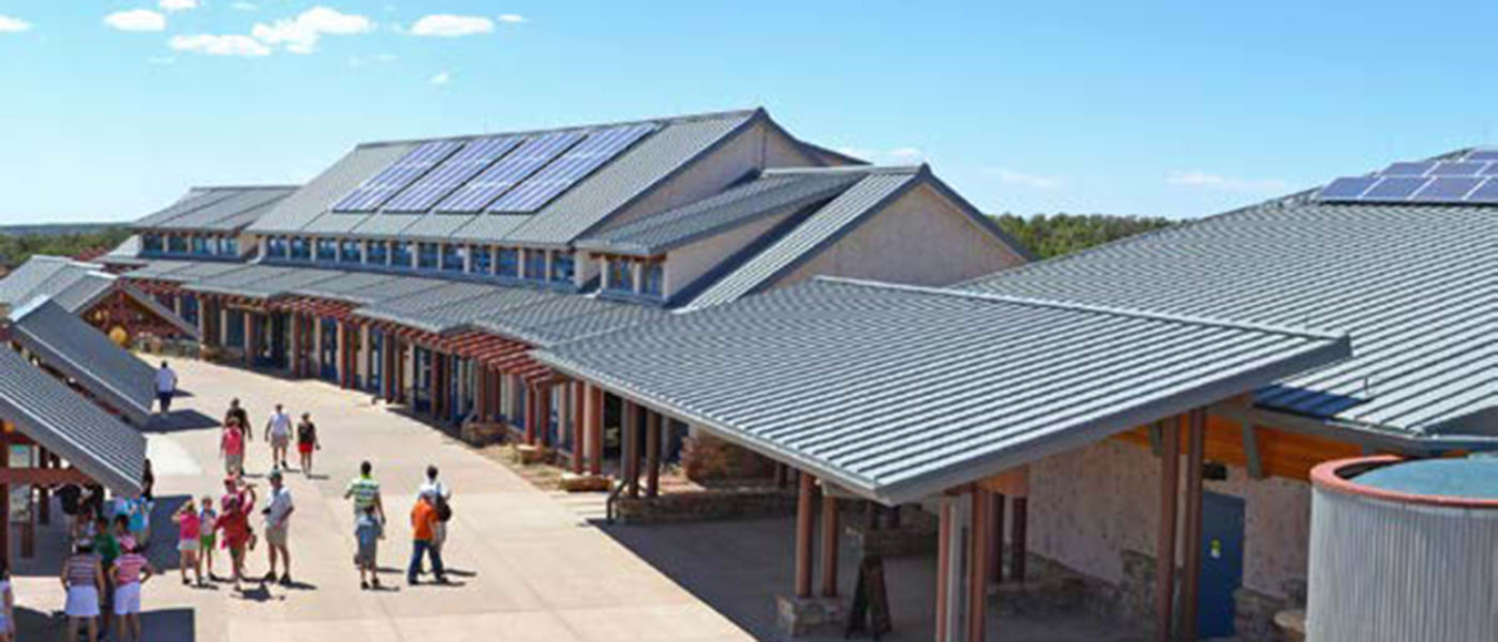 Aerial view of PV panels on the roof of the Grand Canyon Visitor Center.