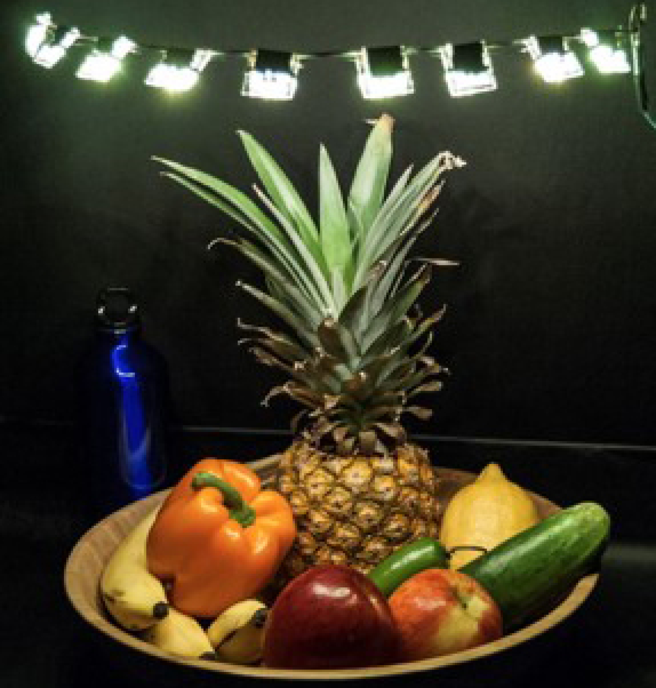 Photo of OLED luminaires illuminating a bowl of fruit