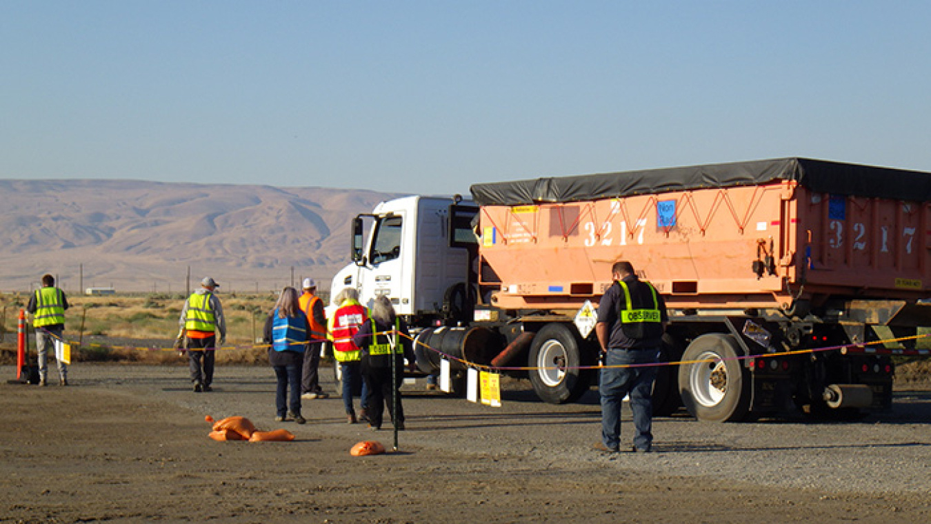 Plutonium Finishing Plant workers conduct mock-ups of waste loadout activities during a management assessment in August to determine preparedness to resume demolition-related activities.