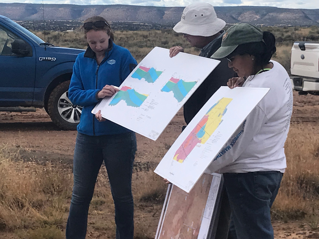 Alison Kuhlman and Dick Johnson (LM Support contractors) and Bernadette Tsosie (LM) explain the hydrogeology of the Bluewater, New Mexico, Disposal Site.