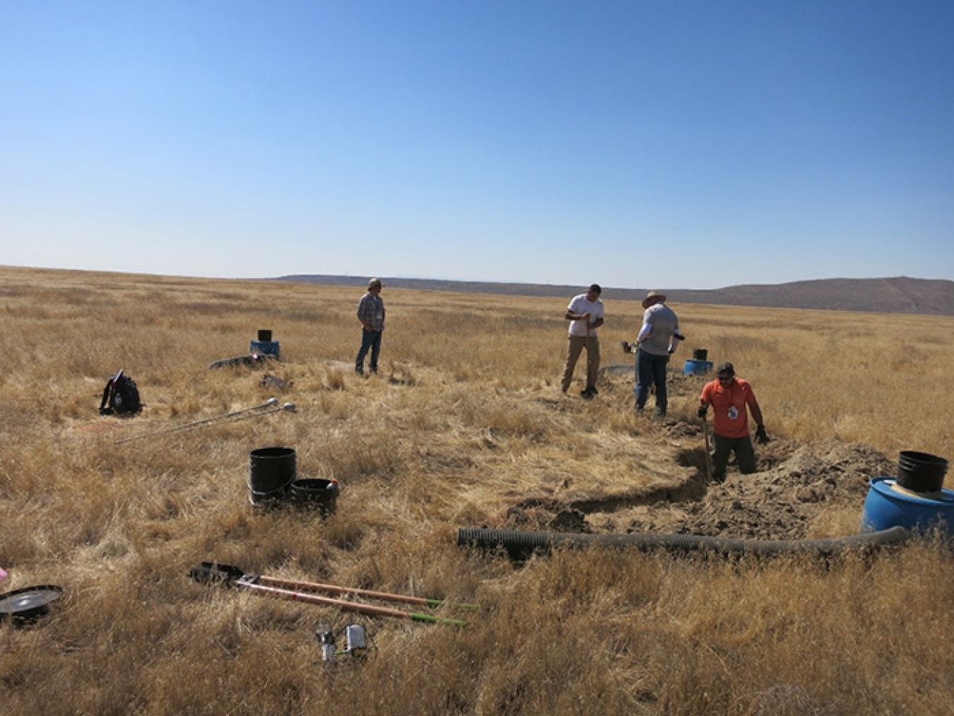 A team with Mission Support Alliance installs new habitats for burrowing owls, providing the birds more nesting areas that can be maintained and monitored over a long-term period.