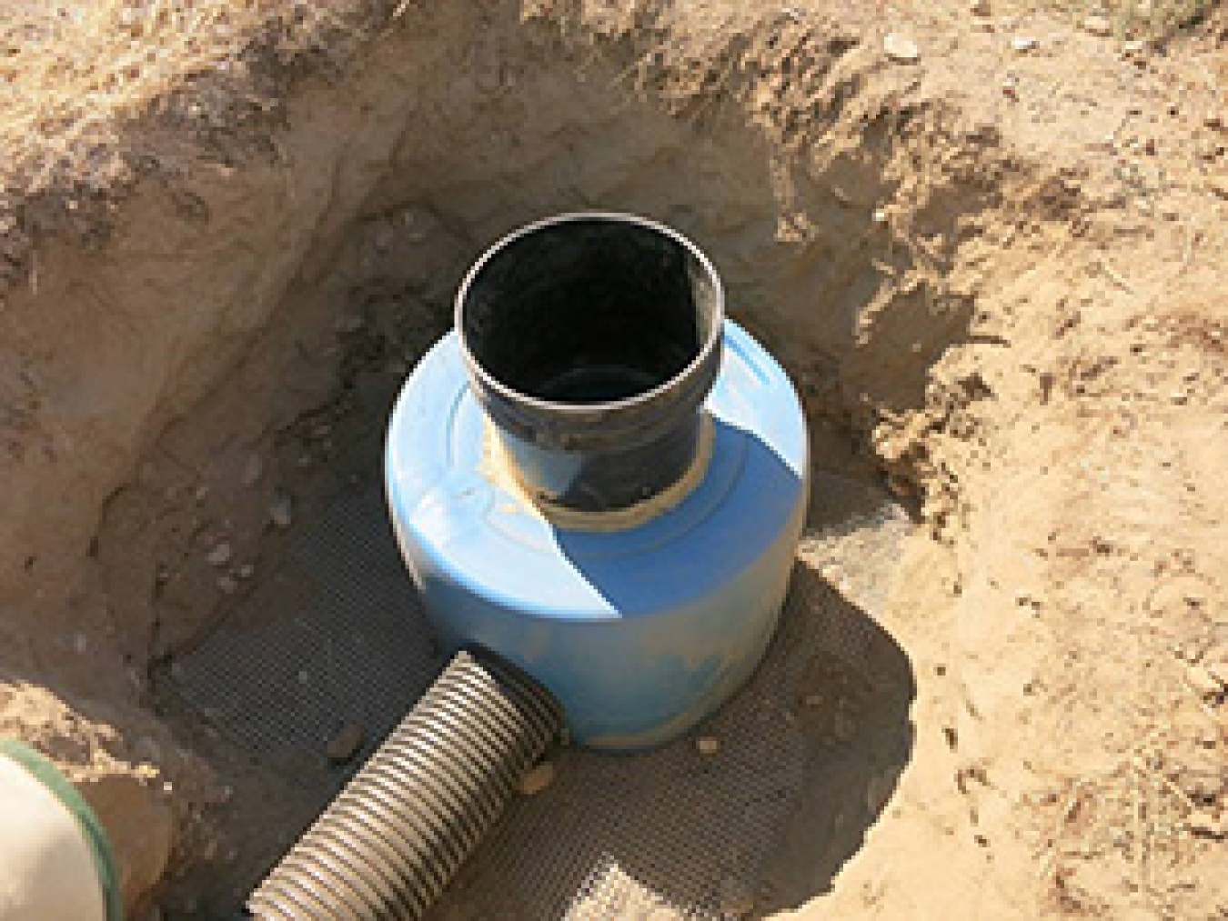 The burrowing owl is considered a Washington state species of concern. Using 55-gallon drum halves and a six-inch plastic tunnel access, workers created an efficient, spacious, and secure nesting space for the sensitive burrowing owls.