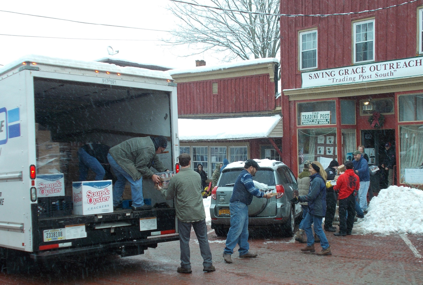 Volunteers deliver 40 turkeys and other items to the Saving Grace Food Pantry as part of this year’s West Valley Demonstration Project Annual Food Drive.