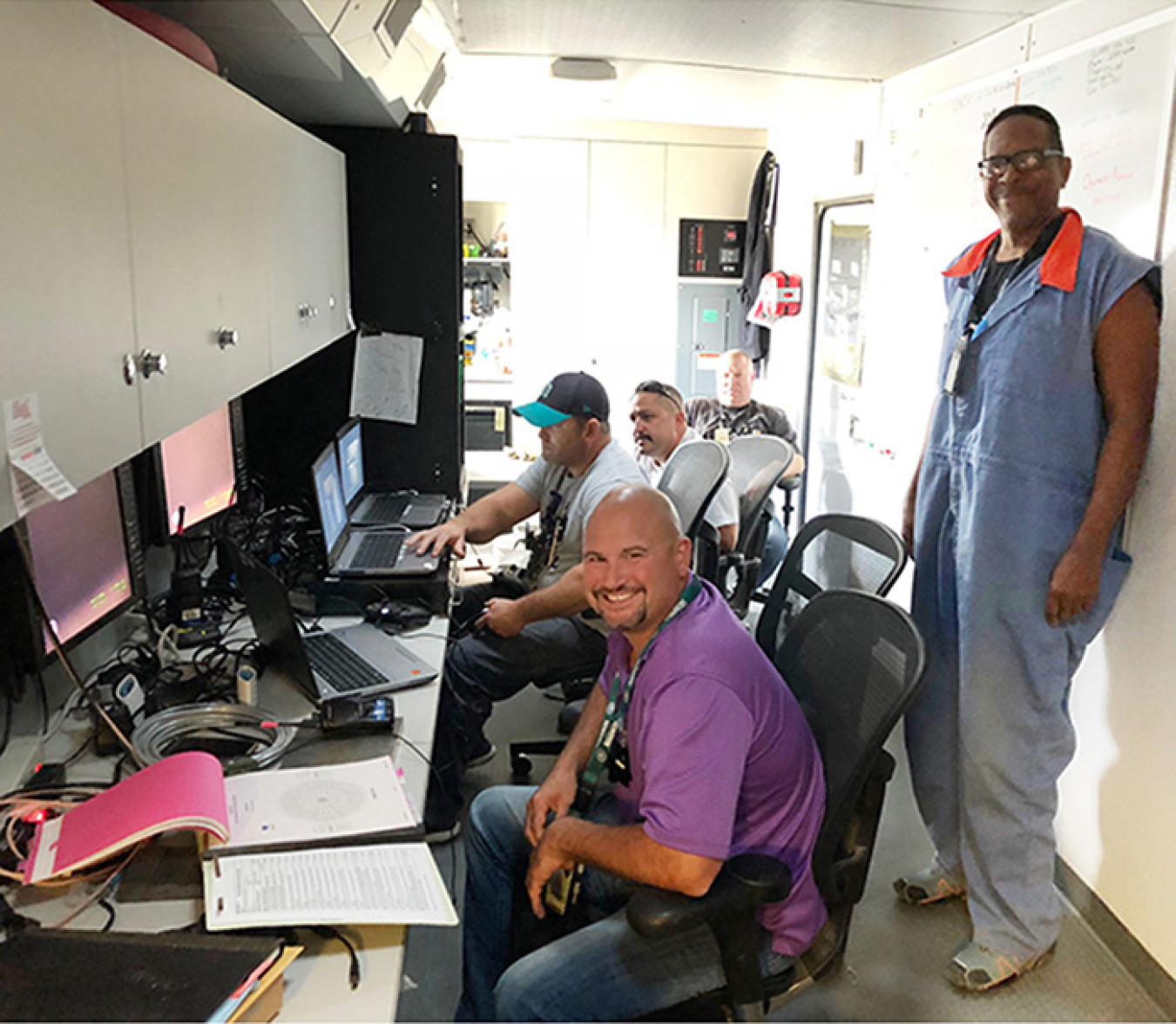 Members of the operations team for Hanford tank farms contractor Washington River Protection Solutions at work during the successful deployment of two visual inspection systems underneath double-shell tank AP-107.