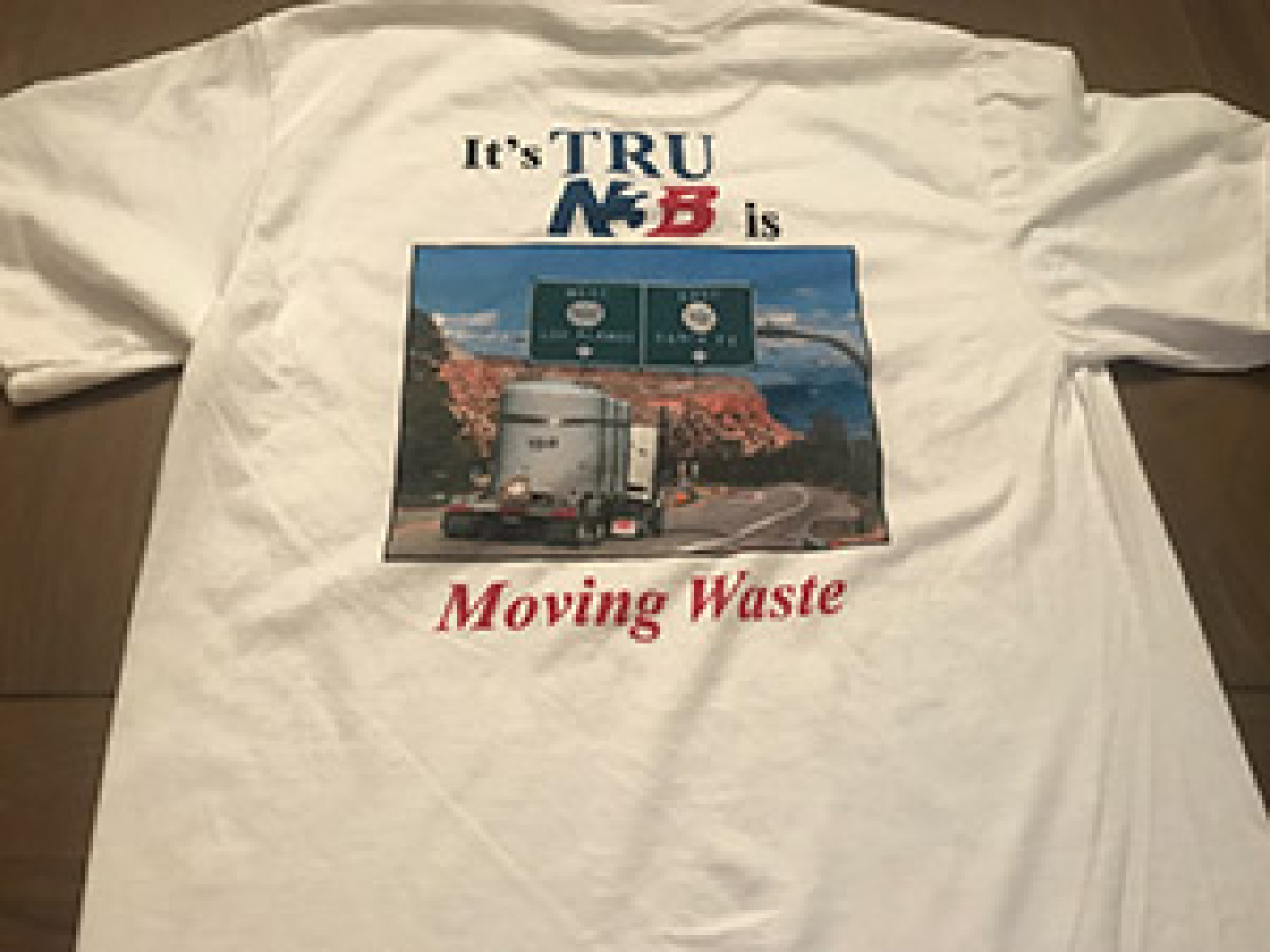 EM Los Alamos Field Office employees gave EM Assistant Secretary Anne White a T-shirt commemorating the first waste shipment from Technical Area 54’s Area G at Los Alamos National Laboratory.