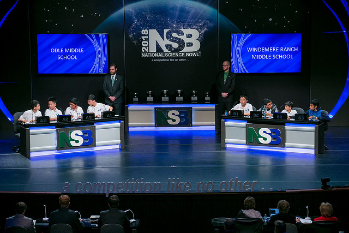 Odle Middle School’s Clarence Zheng, Eric He, Neil Chowdhury and Eric Liu of Bellevue, Wash., compete against Windemere Ranch Middle School’s Anthony Yu, Venkat Ranjan, Prayrak Bajaj and Yash Agarwal of San Ramon, Calif., during the final round of the mid