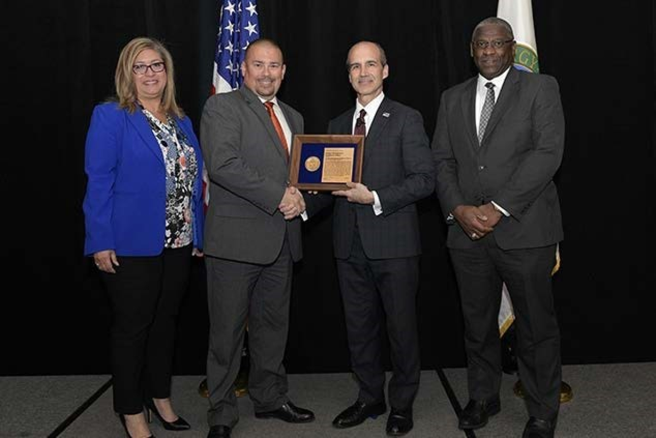 Soni Blanco, Senior Technical Program Manager for Planning and Coordination, SRS; Charles Comeau, Deputy Federal Project Director, SDU Project; DOE Under Secretary of Energy Mark Menezes; and Thomas Johnson, Associate Deputy Manager, SRO Office.