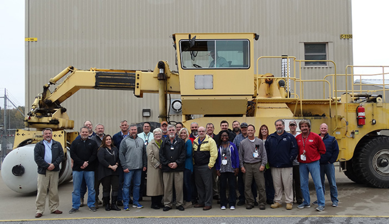 DUF6 project directors and work crews at EM’s Paducah Site commemorate all seven production lines in operation.