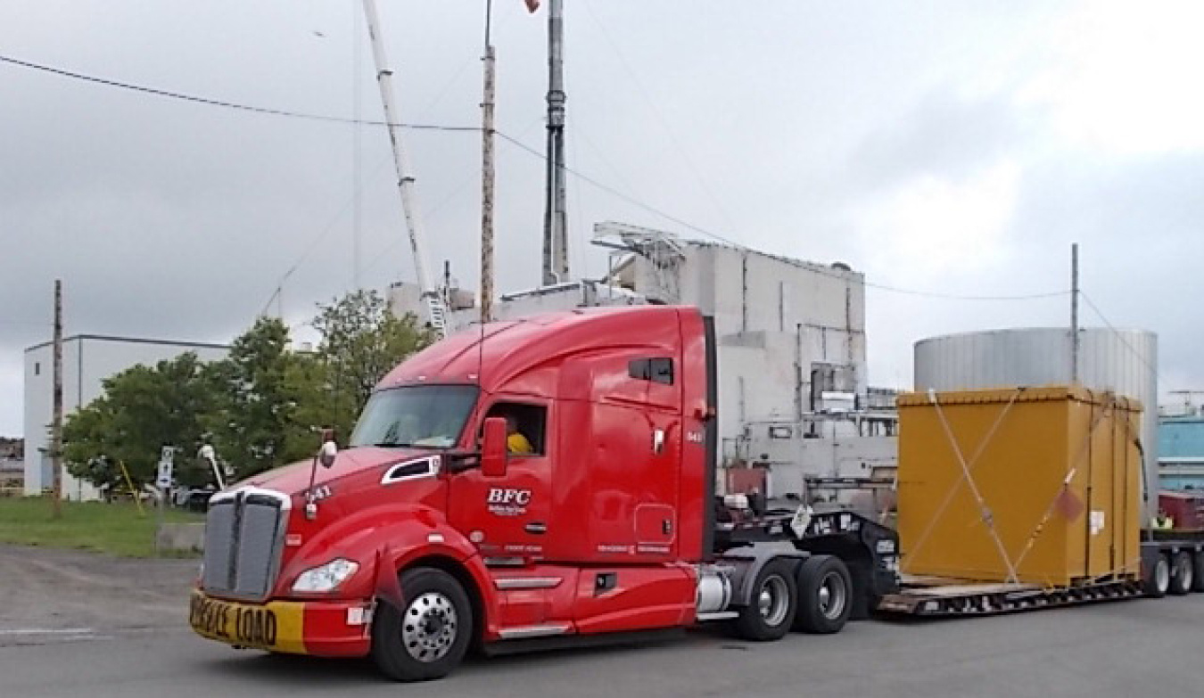 A Buffalo Fuel Corporation truck leaves the West Valley Demonstration Project Site with a waste shipment for disposal. The subcontract with the company was obtained using the Supply Chain Management Center’s eSourcing tool.