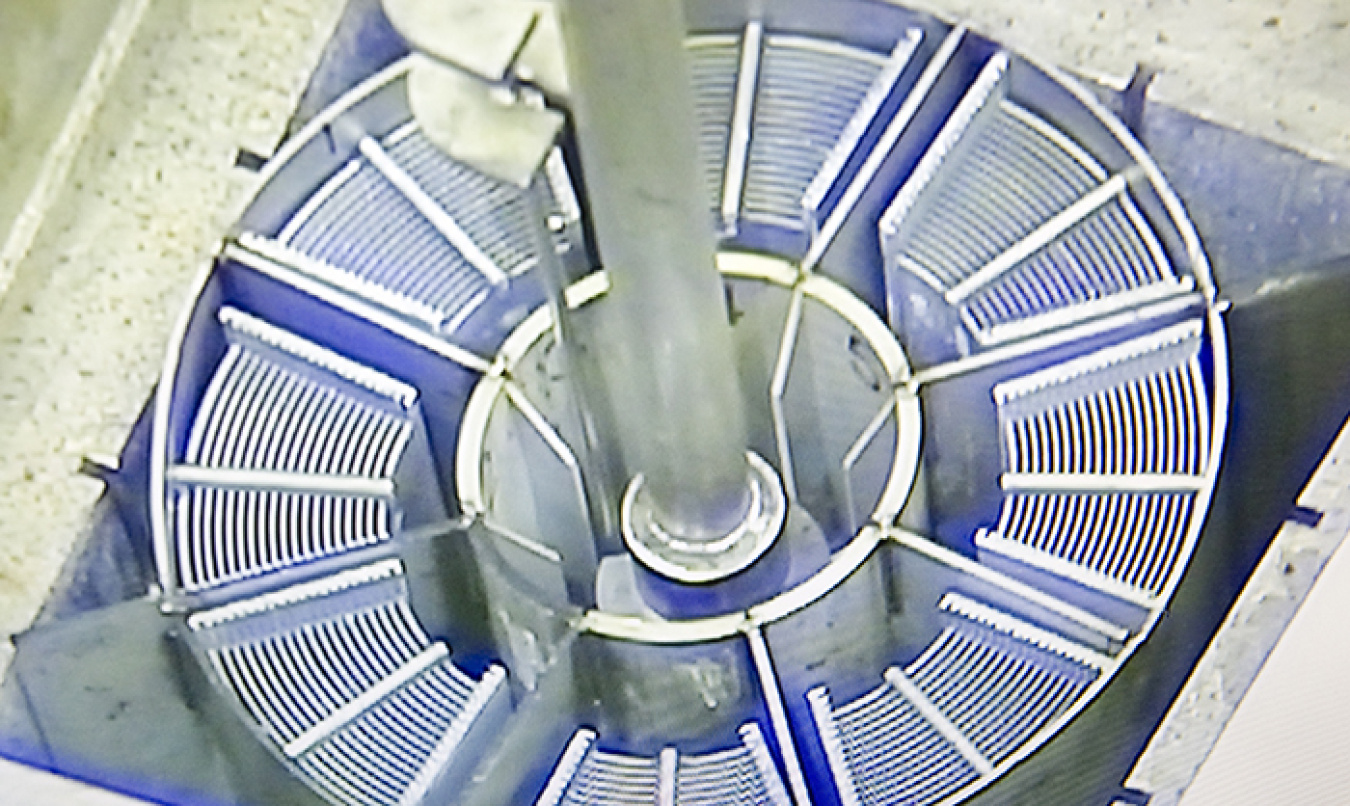 The new four-compartment bucket holds a total of 24 spent fuel elements in the same amount of space as the previously used buckets that held 16 of the elements.