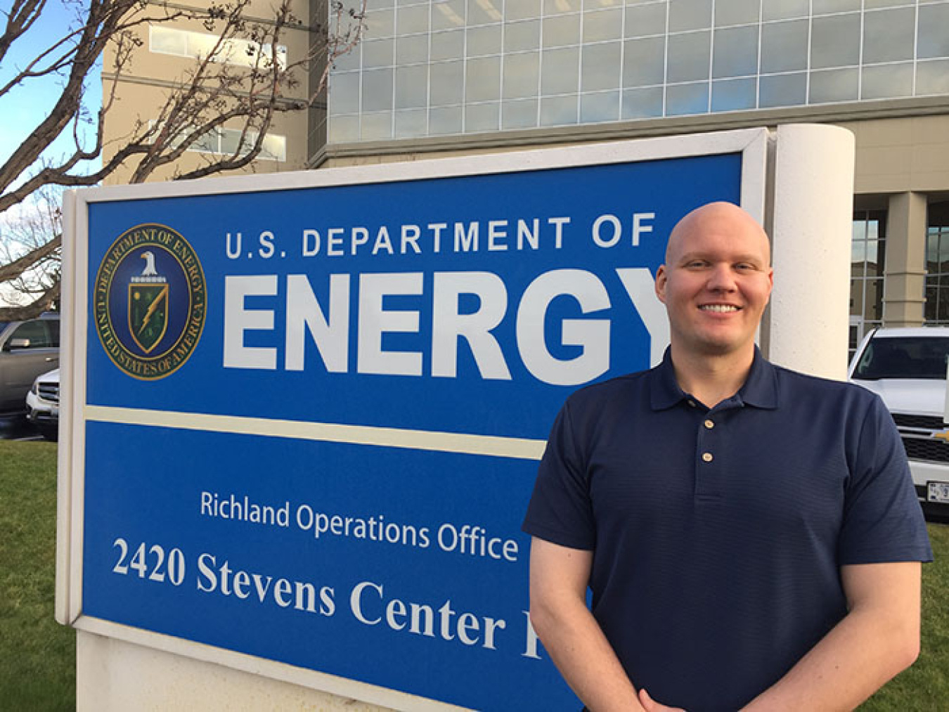 EM Richland Operations Office (RL) Project Engineer Ben Vannah stands outside the RL building in Richland, Washington.