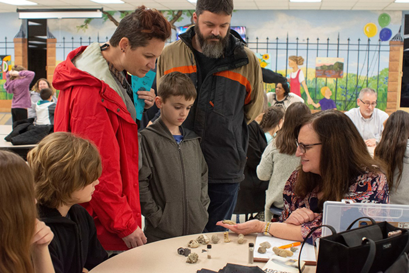 Elizabeth Phillips talks with students about her work as a geologist at the Oak Ridge Office of Environmental Management. She helped them examine the difference between fossils, minerals, gold, and fool’s gold.