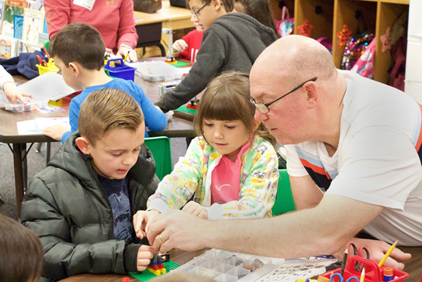 Savannah River Nuclear Solutions engineer Steve Watson helps Millbrook Elementary School students create battery-powered Lego windmills during "Science Enrichment Day" at a school near the Savannah River Site.