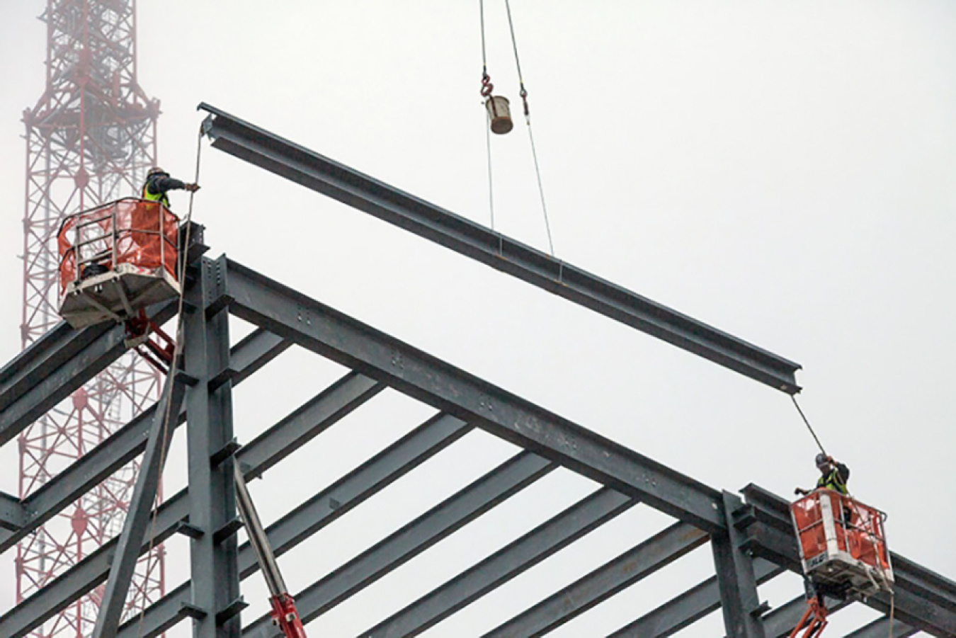 Contractors place the last piece of structural frame on the Mechanical Electrical Building at the Uranium Processing Facility at Y-12 National Security Complex in Oak Ridge, Tennessee.
