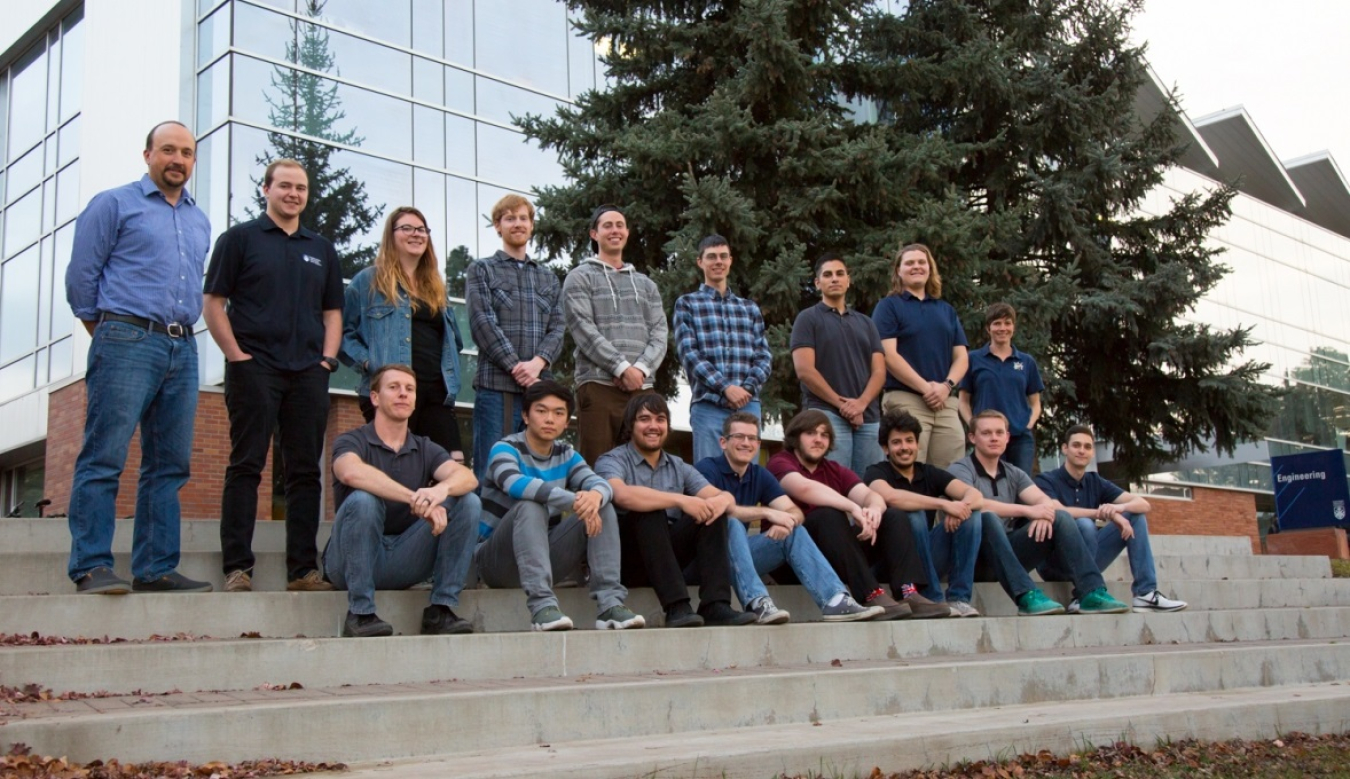 Group of college student sitting on steps.