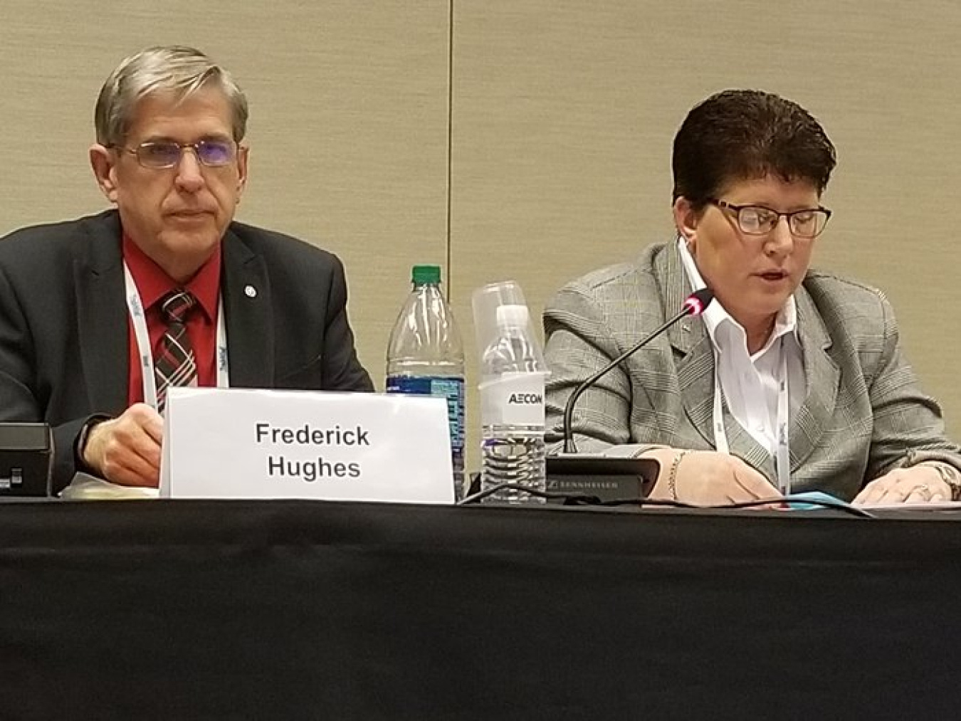 Fred Hughes, Fluor Idaho Program Manager, and Connie Flohr, Associate Deputy Manager of the Idaho Site, co-chair a panel discussing the Idaho TRU Program.