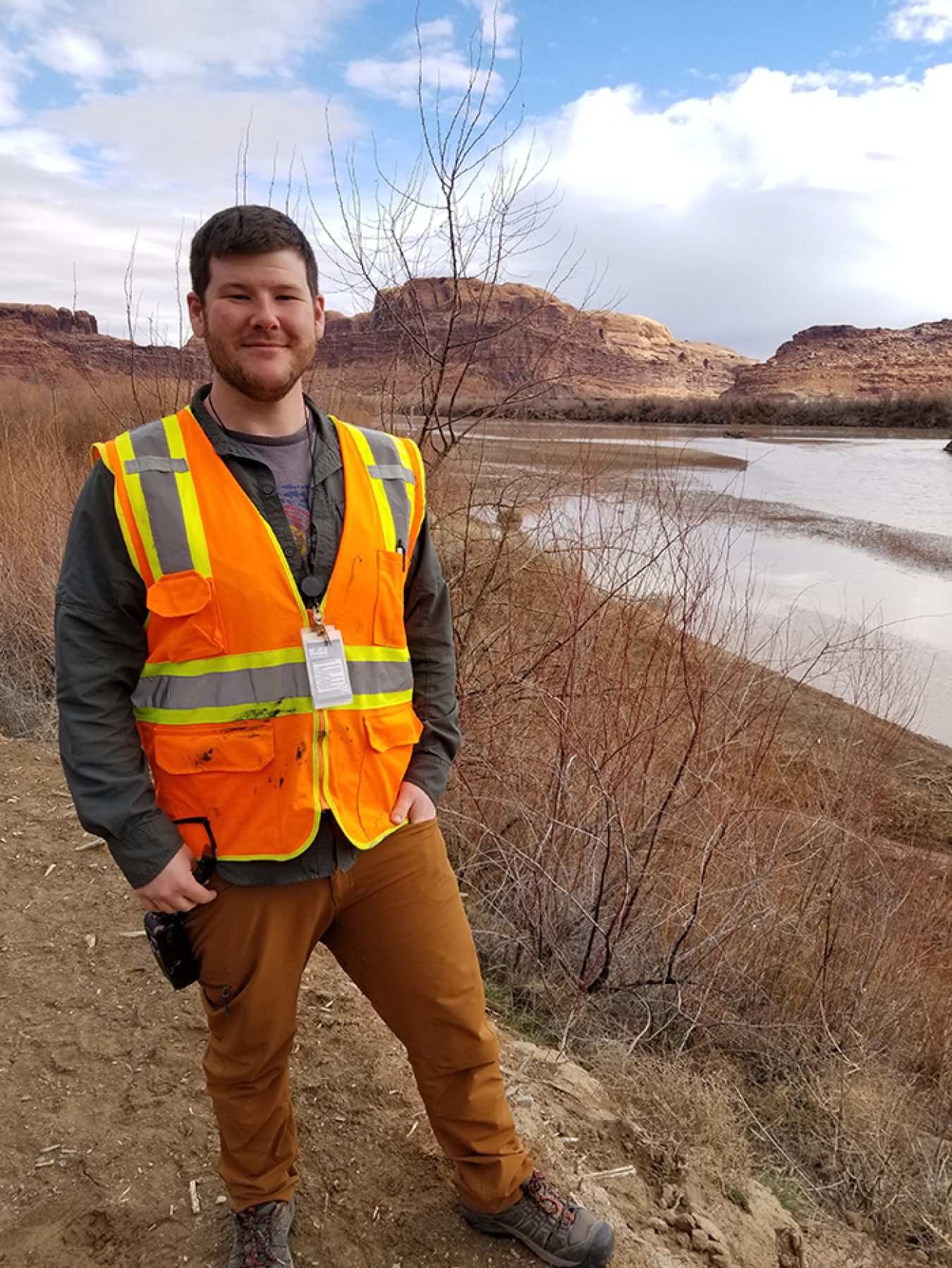Alex McCarty, pictured here along the Colorado River, joined the Moab Uranium Mill Tailings Remedial Action Project in April last year. He is the technical assistance contractor’s environmental analyst.